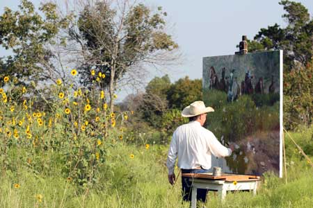 Bruce painting outdoors.